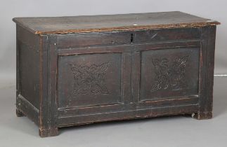 An 18th century oak panelled coffer with hinged lid, height 49cm, width 94cm, depth 42cm (faults).