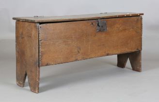 A 17th century oak six-plank boarded coffer with original wire hinges, height 37cm, width 119cm,