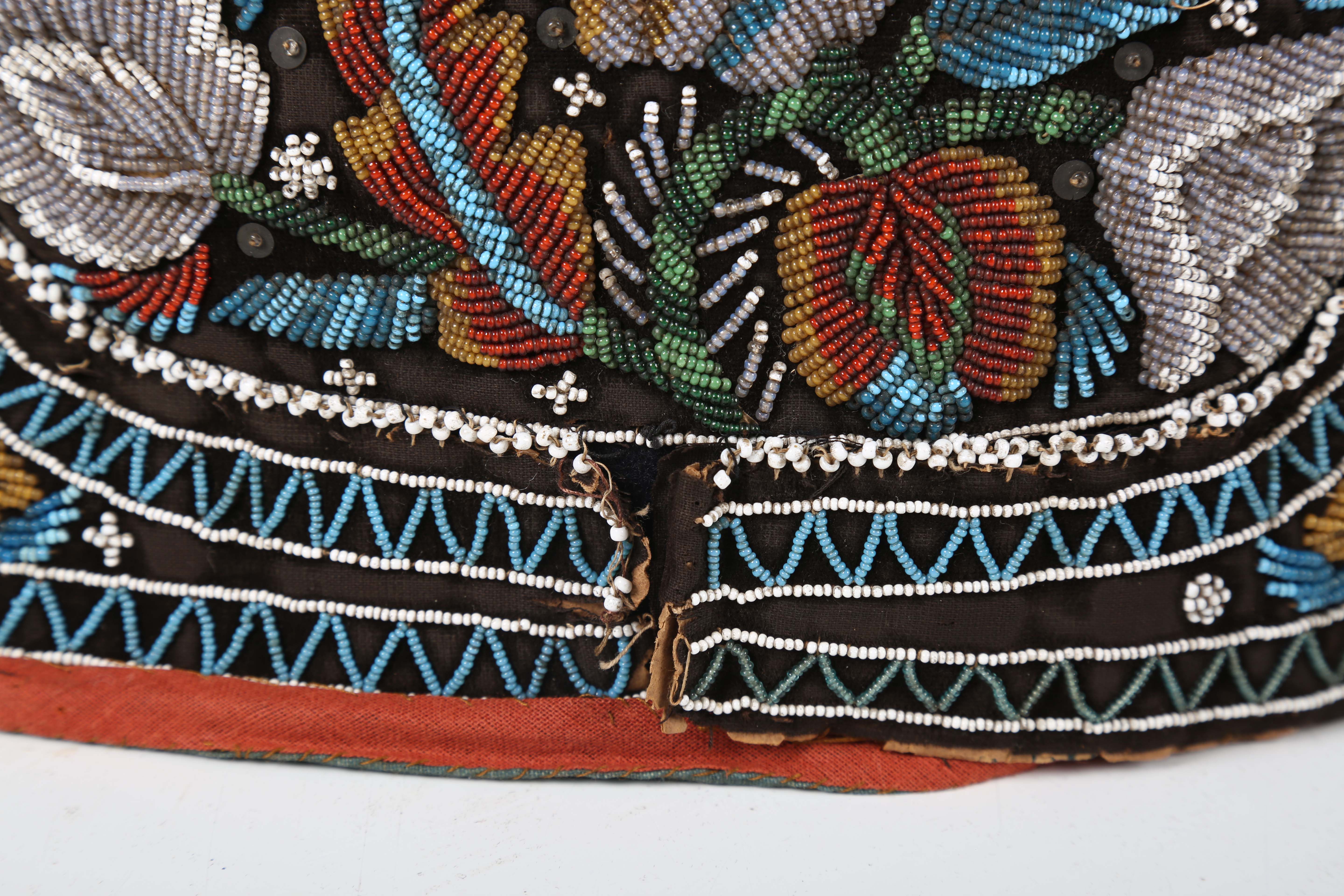 A 19th century beadwork and silk gentleman's cap, heavily beaded with flowers within zig-zag - Image 6 of 13