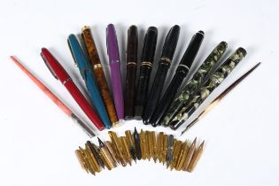 A small group of fountain pens, including a Platignum Regal, a Wyvern 404 and a Summit, together