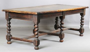 A 19th century oak refectory table, raised on barley twist and block legs, height 79cm, length