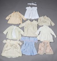 A selection of mainly early 20th century hand-made infants' clothing, mostly linen,