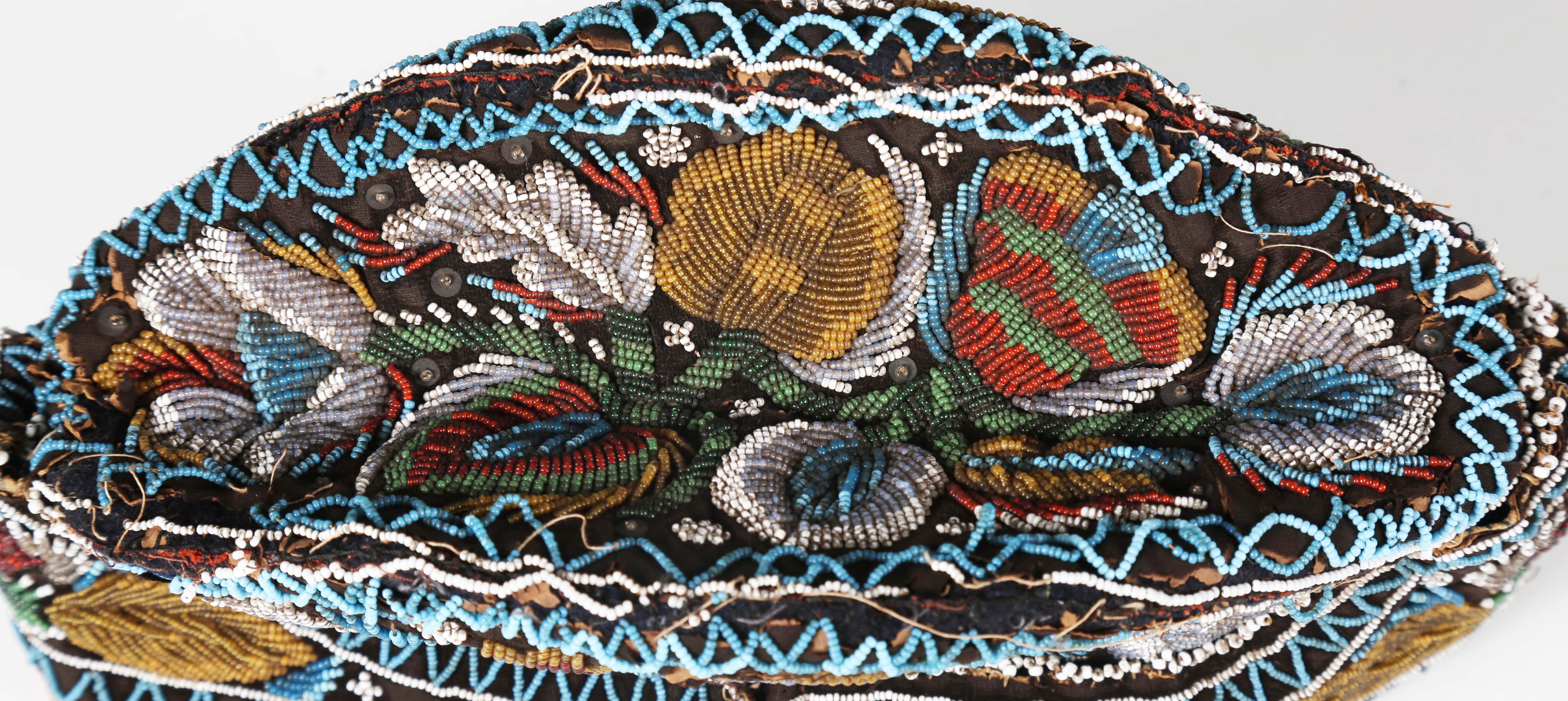 A 19th century beadwork and silk gentleman's cap, heavily beaded with flowers within zig-zag - Image 3 of 13