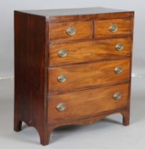 A George III mahogany chest of two short and three graduated long drawers, on bracket feet, height