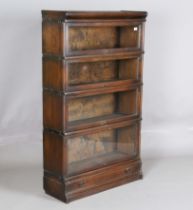 An early 20th century oak four-section Globe Wernicke library bookcase, height 147cm, width 87cm,