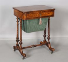 A mid-Victorian burr walnut work table, fitted with a drawer and a basket slide, height 71.5cm,
