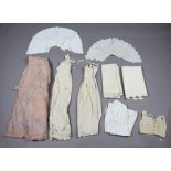 A collection of mainly Victorian infants' clothing and bedding, including a group of felted wool