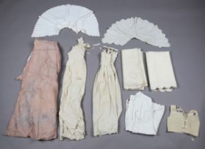 A collection of mainly Victorian infants' clothing and bedding, including a group of felted wool