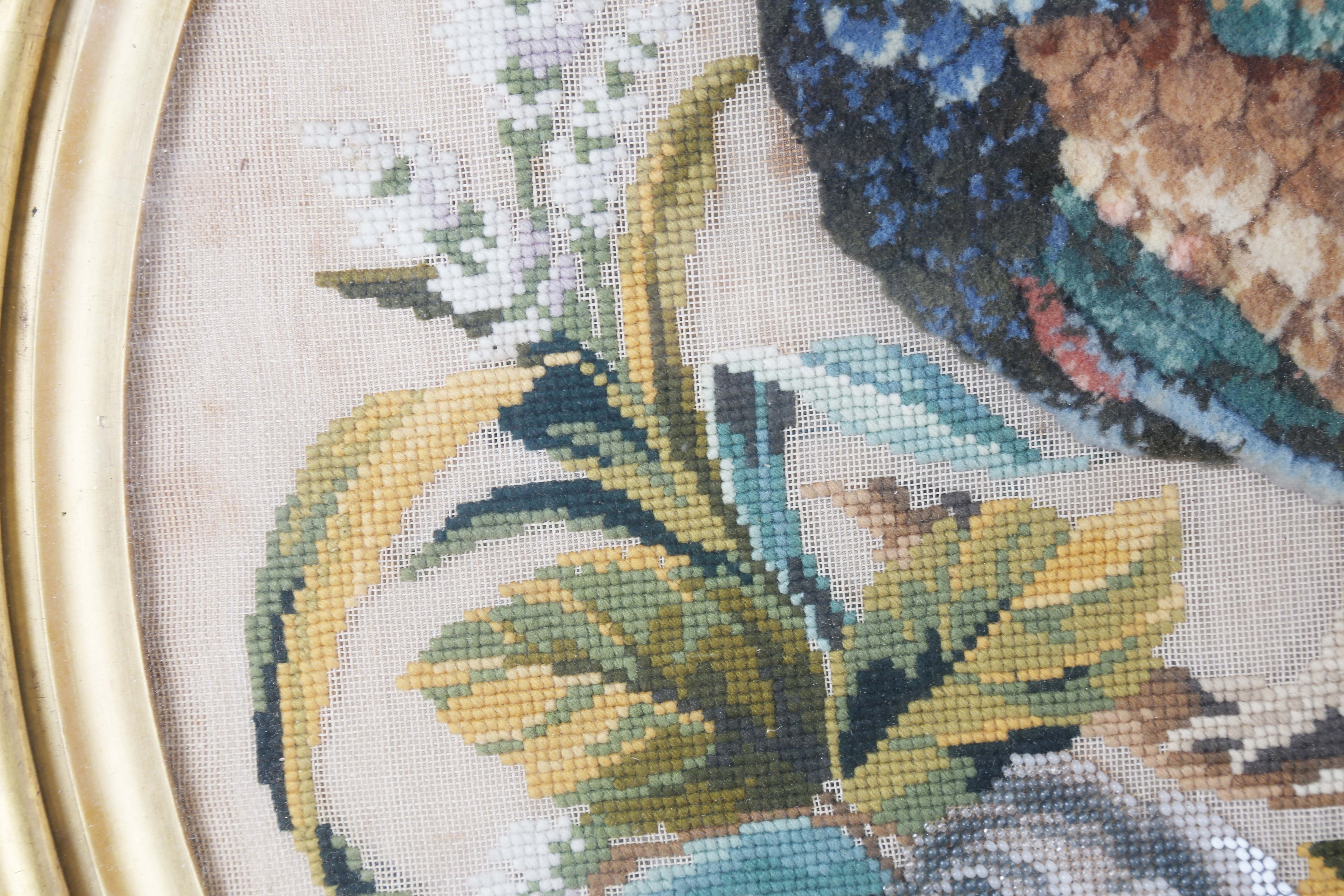 A Victorian wool and raised plush work tondo panel of a peacock standing within a floral surround, - Image 6 of 10