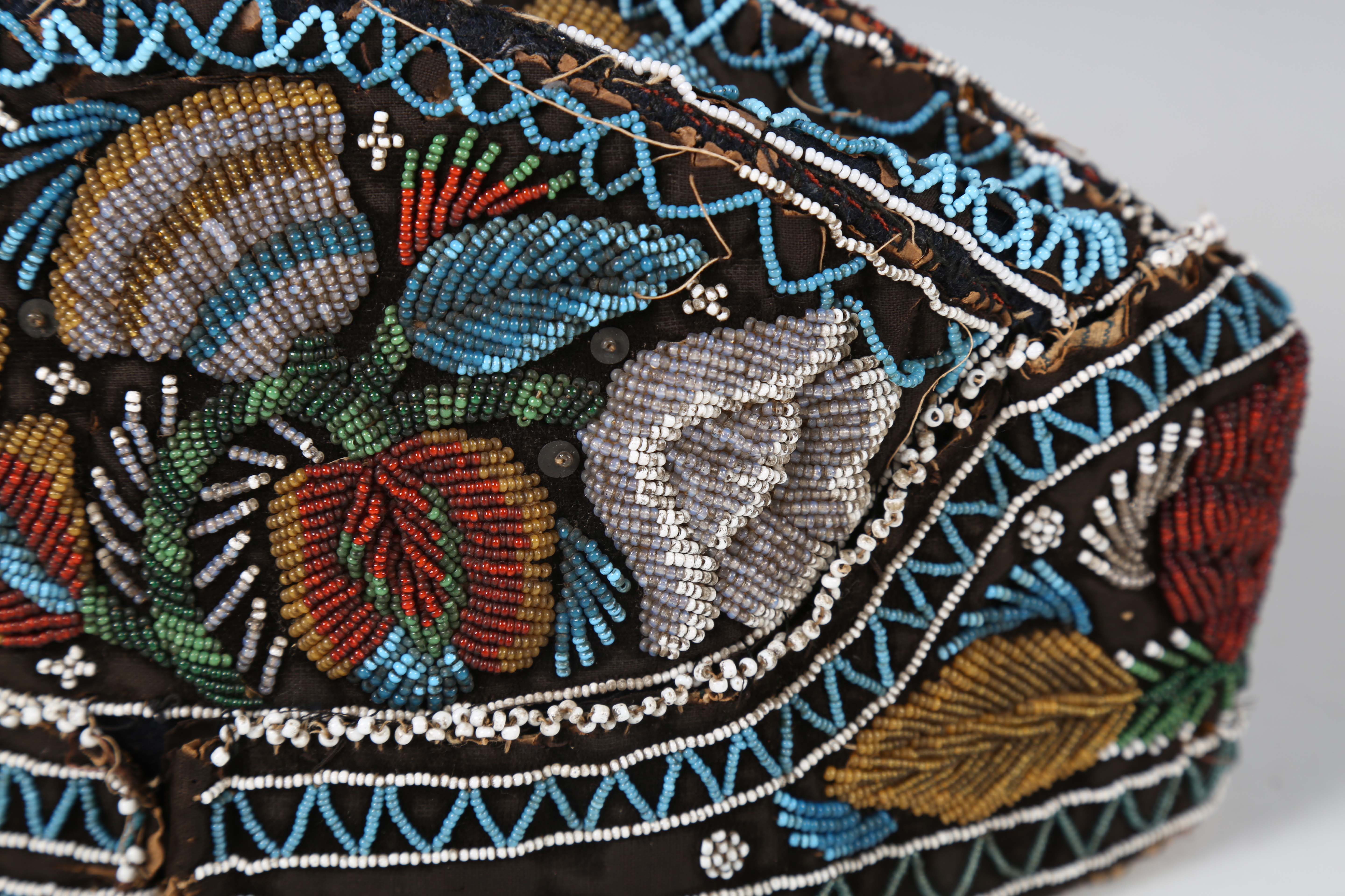A 19th century beadwork and silk gentleman's cap, heavily beaded with flowers within zig-zag - Image 5 of 13