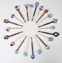 A large collection of mainly 20th century bone and wooden lace making bobbins of various designs.