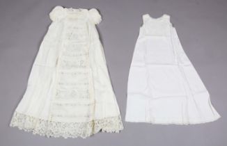 A fine early 20th century cream linen christening gown with Honiton lace embellishment and point
