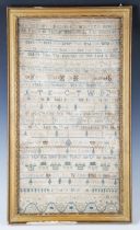 A George II needlework sampler by Elizabeth Monk, dated 'July 12 1751', finely worked with overall