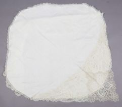 A fine early 20th century cream double cape with deep borders of Honiton lace with point de gaze