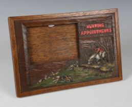An early 20th century Swaine & Adeney oak 'Hunting Appointments' holder, relief carved with a