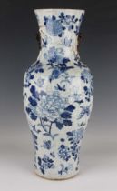 A Chinese blue and white crackle glazed porcelain vase, late Qing dynasty, of baluster form, painted