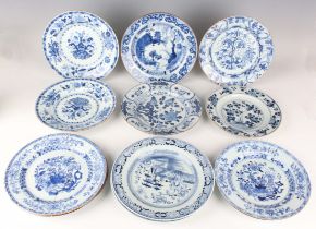 A group of eleven Chinese blue and white export porcelain circular plates, Kangxi period and later