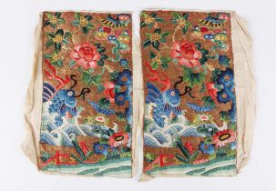 A pair of Chinese silk embroidered rectangular panels, late Qing dynasty, each finely worked in