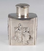 A Chinese export silver tea caddy and cover, circa 1900, of lobed rectangular form, the sides