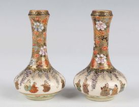 A pair of Japanese Satsuma earthenware bottle vases by Kozan, Meiji period, each compressed circular