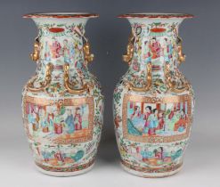 A pair of Chinese Canton famille rose porcelain vases, mid to late 19th century, each of