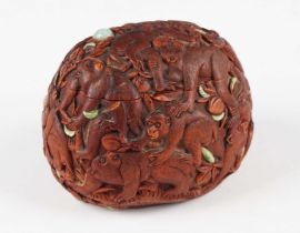 A Japanese carved boxwood monkey and peaches tonkotsu (tobacco box and cover) by Ikko, Meiji period,