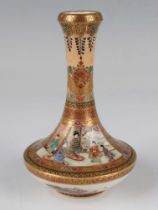 A Japanese Satsuma earthenware bottle vase by Unzan, Meiji period, the compressed circular body