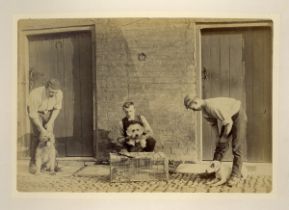 PHOTOGRAPHS. An album containing approximately 44 mounted photographs of a country house, circa