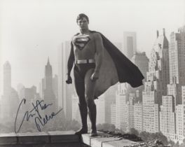 AUTOGRAPH. A black and white photograph signed by Christopher Reeve depicting the actor in the