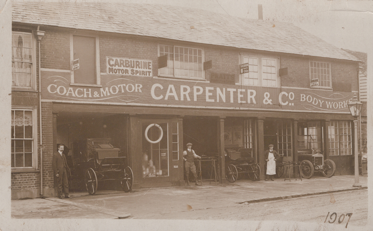 GARAGES. An album containing approximately 64 postcards, photographs and reprints of motorcar - Image 3 of 9