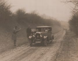 ALVIS. A collection of approximately 74 photographs and 3 postcards of Alvis motorcars, including