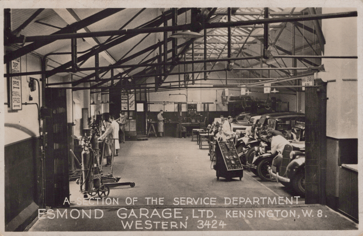 GARAGES. An album containing approximately 64 postcards, photographs and reprints of motorcar