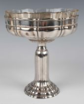 A German .800 silver tazza, the circular bowl of lobed form, raised on a similarly decorated