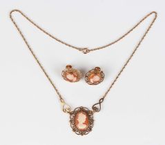 A 9ct gold and shell cameo necklace, carved as a portrait of a lady within a scroll pierced