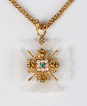 An early Victorian gold, emerald, half-pearl and chalcedony pendant in a cruciform design, mounted