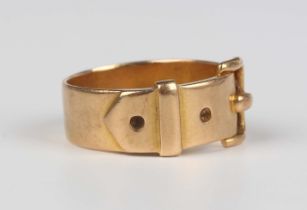 A Victorian 18ct gold ring in a buckle and strap design, London 1881, weight 9.8g, ring size