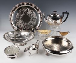 A group of plated items, including a three-piece tea set, a pair of Venetian pattern fish servers,