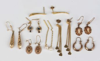 Six pairs of 9ct gold earrings in a variety of designs, including a pair of 9ct gold and sapphire
