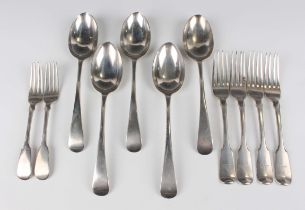 A set of four William IV silver Fiddle pattern table forks, London 1832 by William Theobalds, a pair