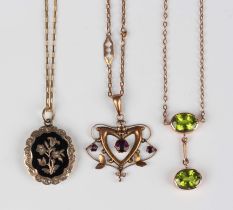 A gold and peridot pendant necklace, the front mounted with two oval cut peridots connected by a