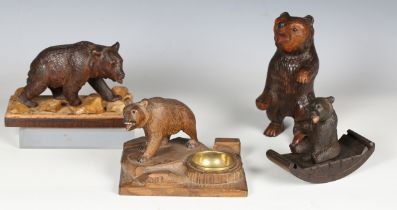 An early 20th century Swiss Black Forest carved softwood dish stand with bear surmount, width