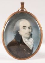 Circle of George Engleheart - a late 18th/early 19th century half-length portrait miniature of a