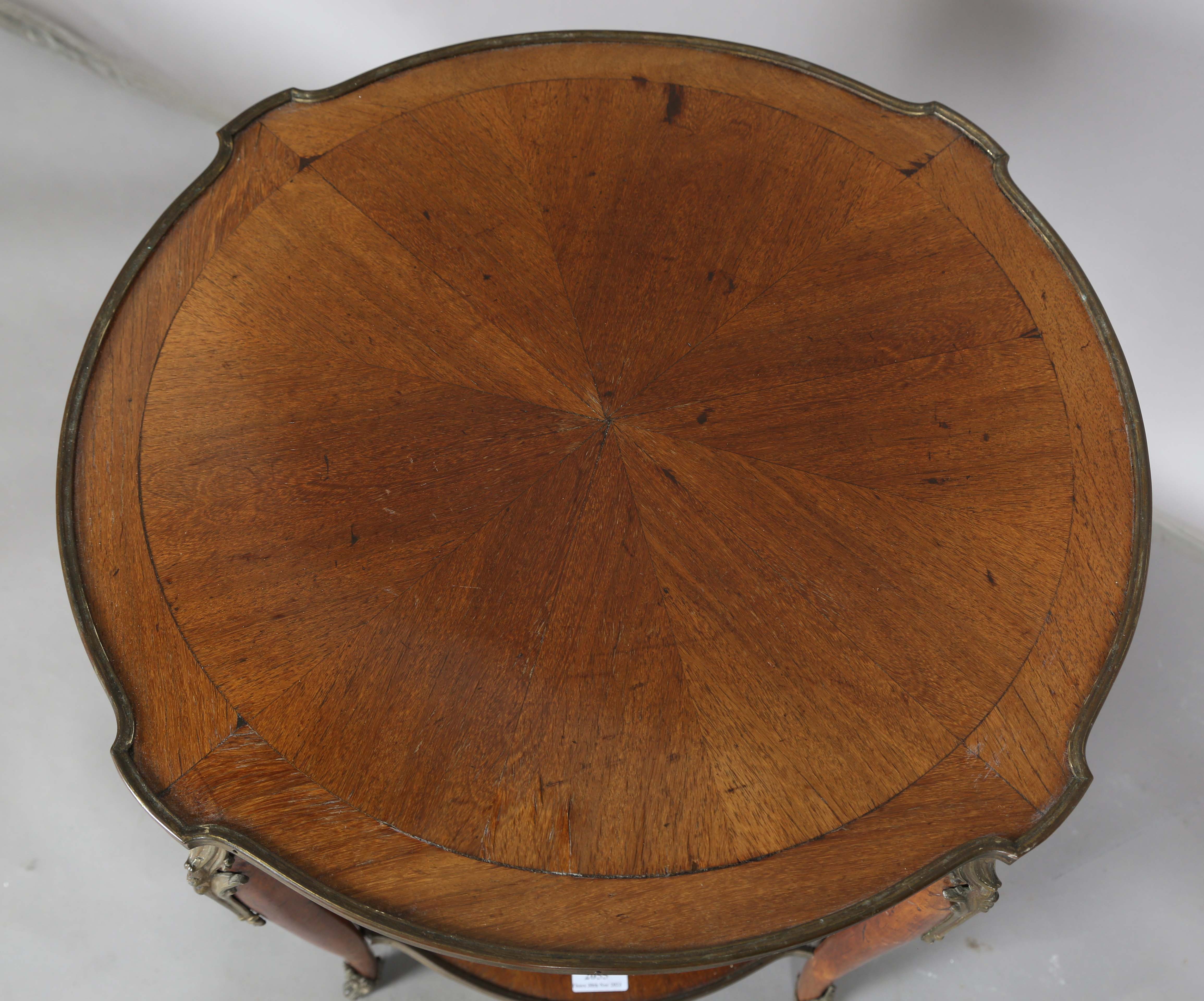 An early 20th century French walnut two-tier occasional table with radial veneers and gilt metal - Image 11 of 11