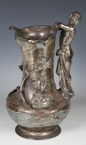 An early 20th century German plated alloy jug, probably by WMF, modelled with figural handle and