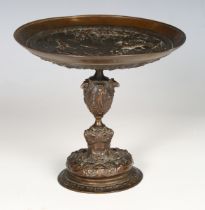 A 19th century brown patinated cast bronze tazza, the circular top finely decorated in relief with a