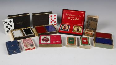 A collection of playing cards, including two boxed Tiffany & Co sets, and a Warne's 'Card Tricks