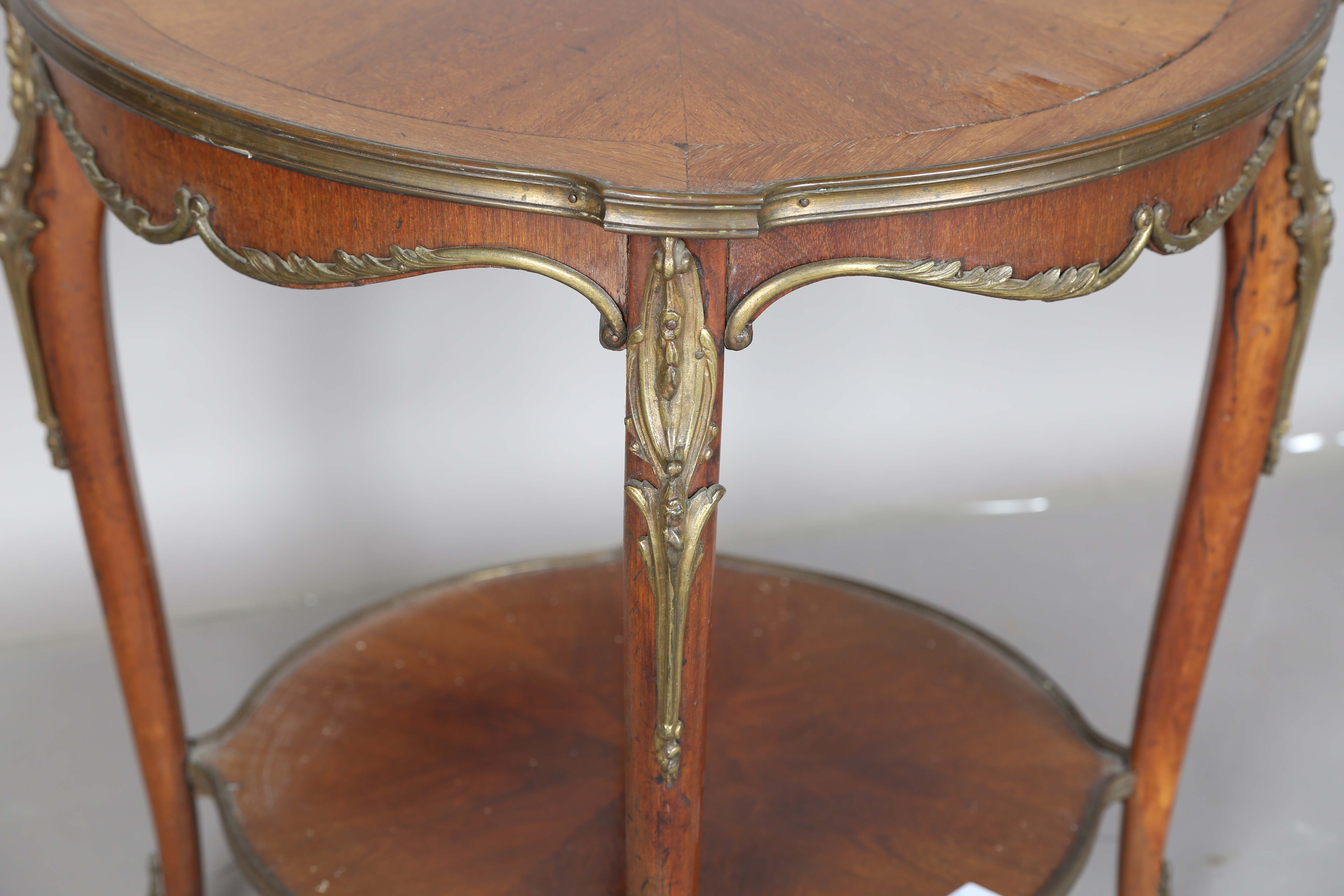 An early 20th century French walnut two-tier occasional table with radial veneers and gilt metal - Image 5 of 11