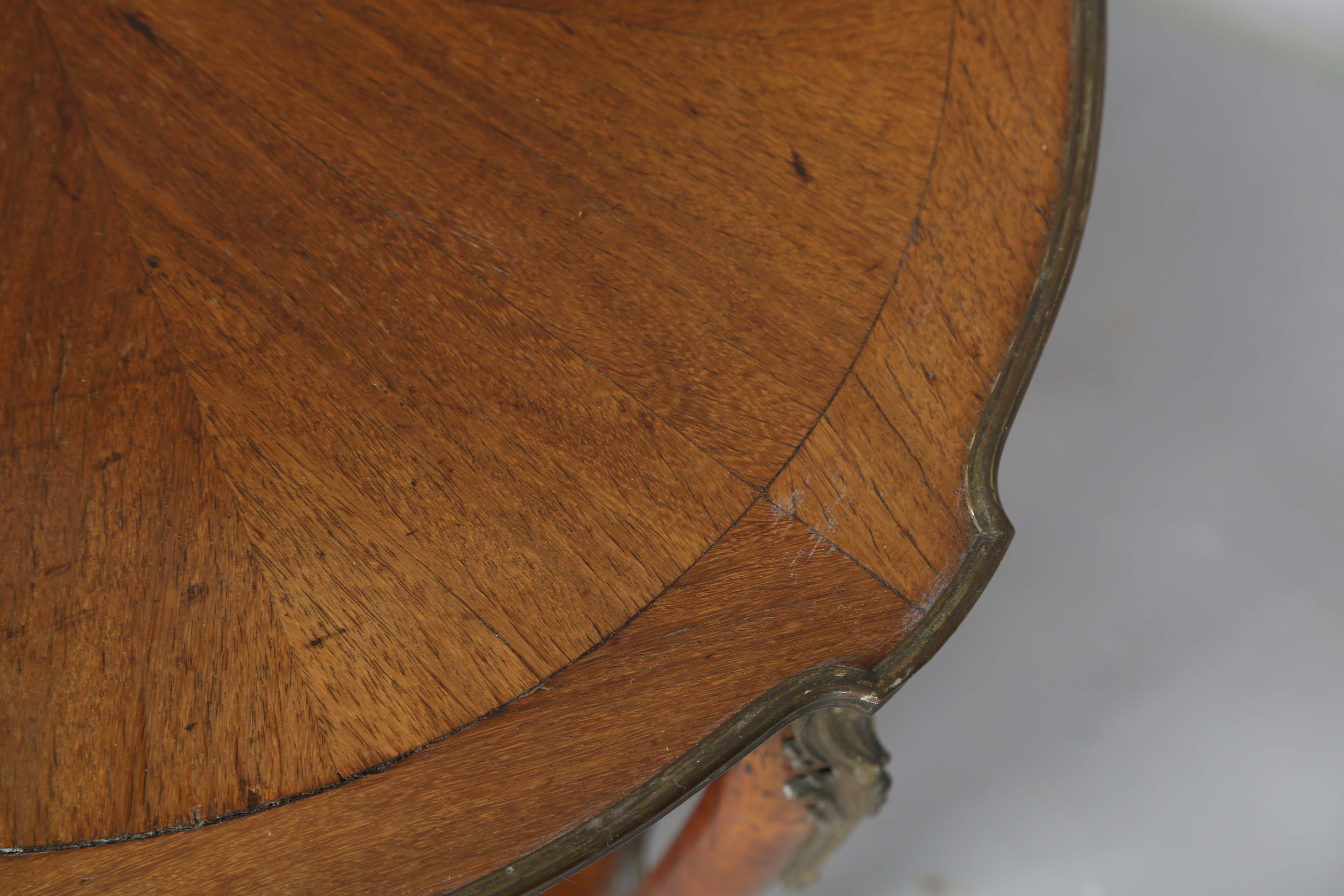 An early 20th century French walnut two-tier occasional table with radial veneers and gilt metal - Image 9 of 11