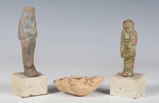 An ancient Egyptian blue faience ushabti, height 11.5cm, another green glazed pottery ushabti,