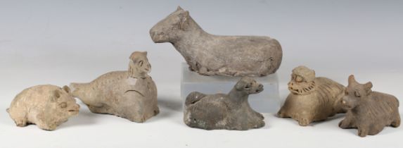 A group six Chinese terracotta greyware models of animals, probably Yuan Dynasty, one modelled as